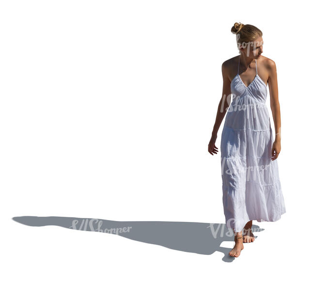 cut out woman in a white summer dress walking seen from above