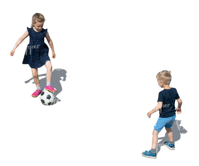 two cut out kids playing football seen from above