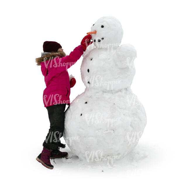 cut out little girl making a snowman