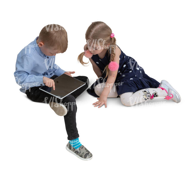 two cut out kids sitting and playing with a tablet