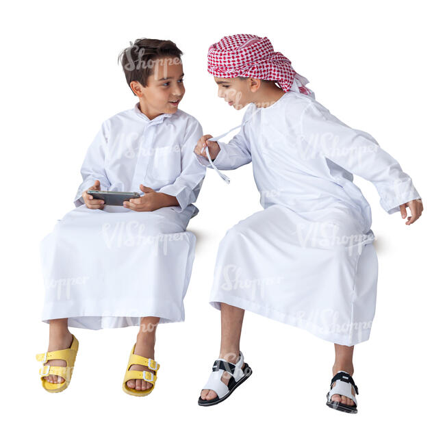 two cut out arab boys with phone sitting and smiling