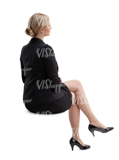 cut out woman in a black classical business suit sitting