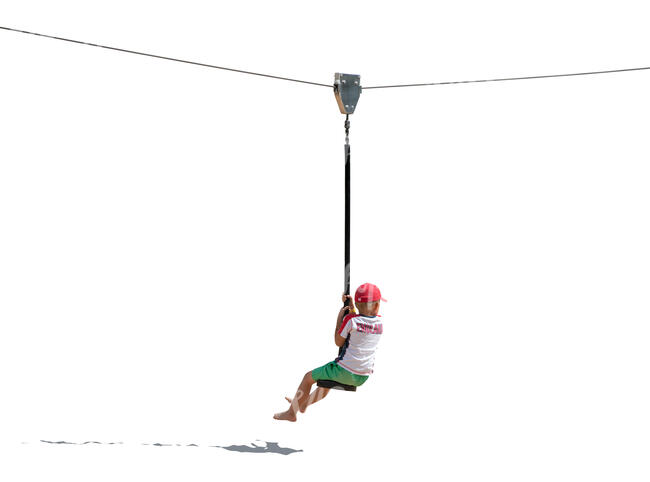 cut out boy swinging on a playground equipment