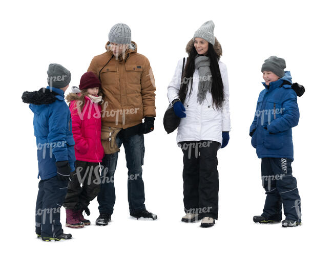 cut out family with three kids  standing together in winter