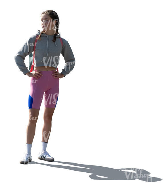 cut out backlit sporty woman standing