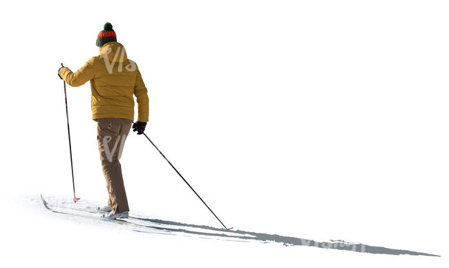 cut out backlit man skiing