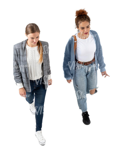 two cut out women walking seen from above