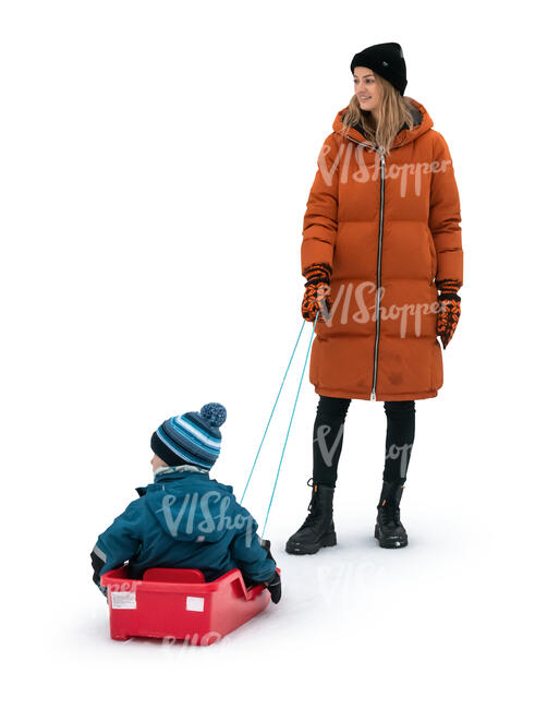 cut out woman standing with her son sitting on a sledge