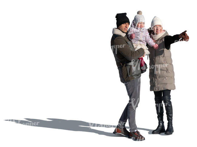 cut out family with a baby standing and pointing in winter