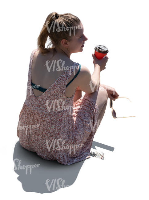 cut out backlit woman sitting and drinking coffee