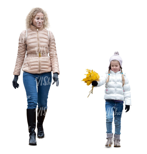 cut out woman and her daughter with a bunch of fallen leaves walking in autumn