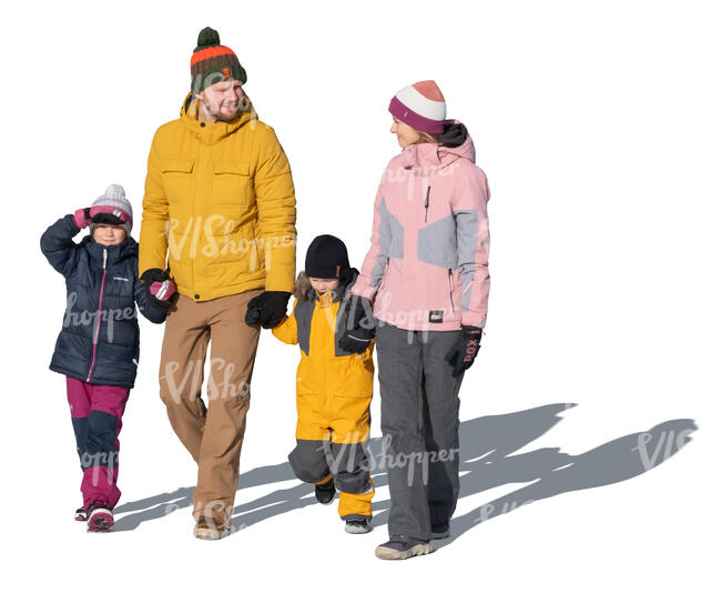 cut out family with two kids walking hand in hand on a sunny winter day