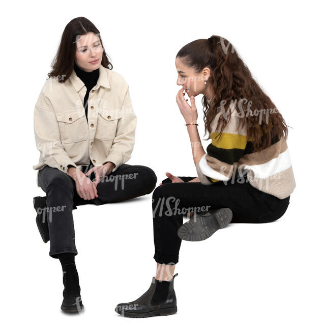 two cut out women sitting and talking