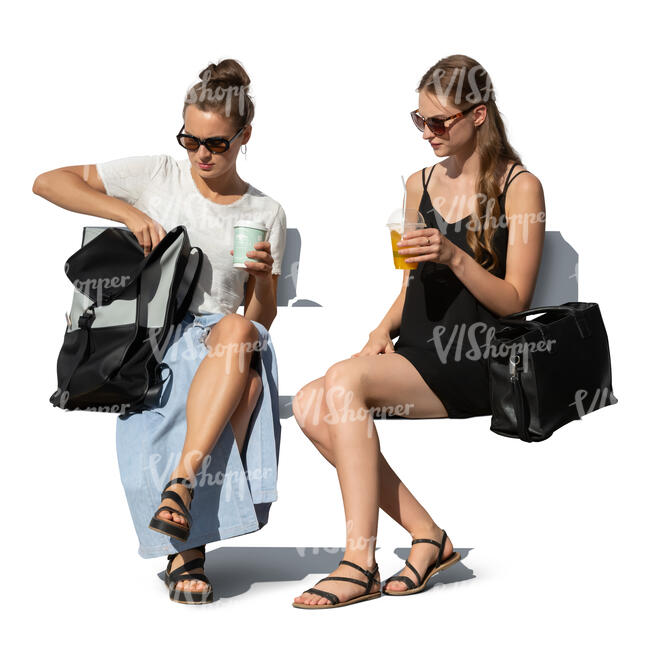 two cut out women with refreshing driknks sitting outside in summer