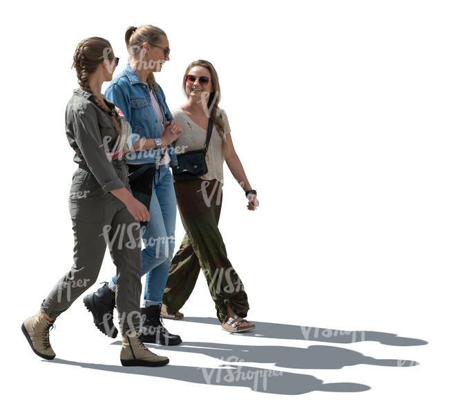 cut out backlit group of three women walking