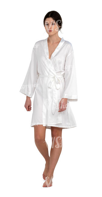cut out woman in a white bathrobe walking barefoot