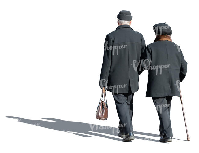 cut out elderly couple in overcoats walking arm in arm