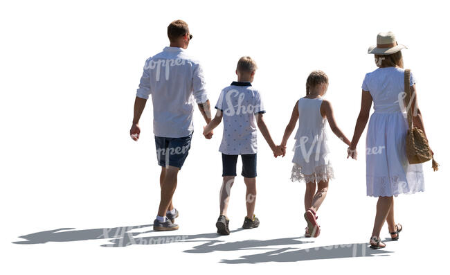 cut out backlit family in summer walking hand in hand