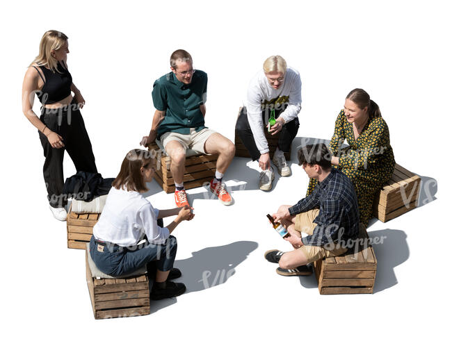 cut out group of young people sitting and talking seen from above