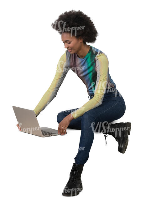 cut out black woman with a laptop sitting and working