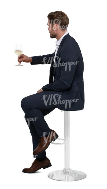 cut out man sitting at a bar and drinking wine