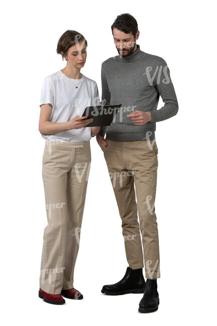 two cut out people standing and reading some papers