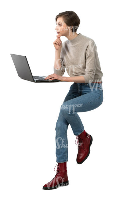 cut out woman sitting at a barstool office desk with laptop