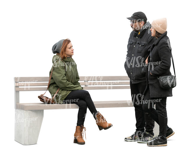 cut out woman sitting and talking to a couple standing next to her