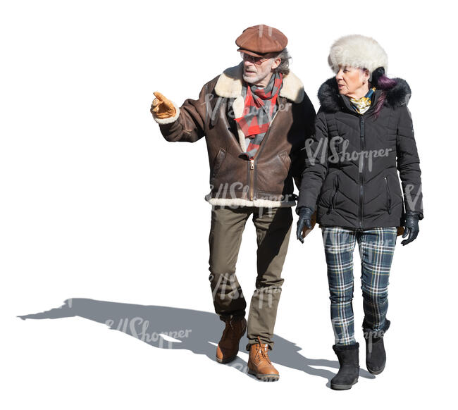 two cut out elderly people walking in wintertime