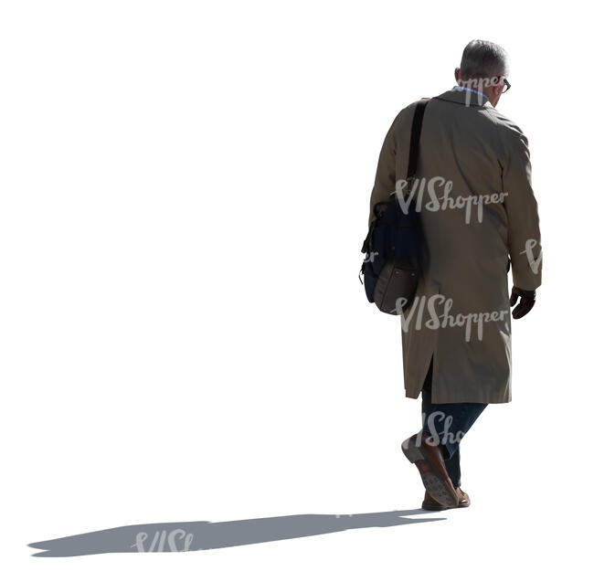cut out older backlit man in a trenchcoat walking
