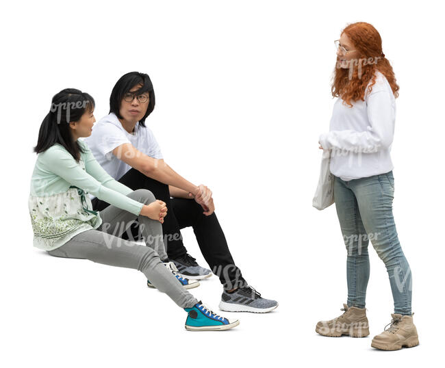 cut out woman standing and talking to two friends sitting on the stairs