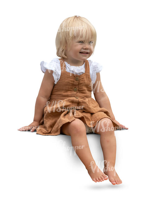 cut out little girl sitting barefoot and smiling