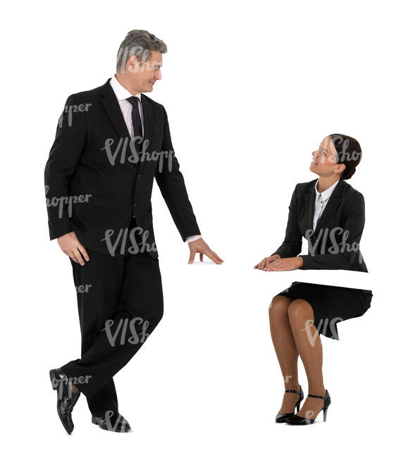 cut out man at office talking to a woman sitting at a work desk 