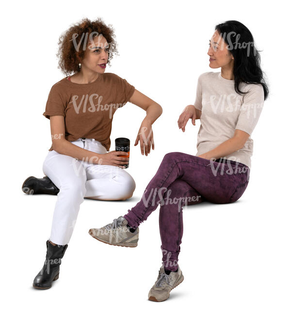 two cut out women sitting and drinking coffee and talking