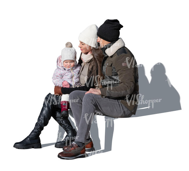 cut out family in winter sitting outside