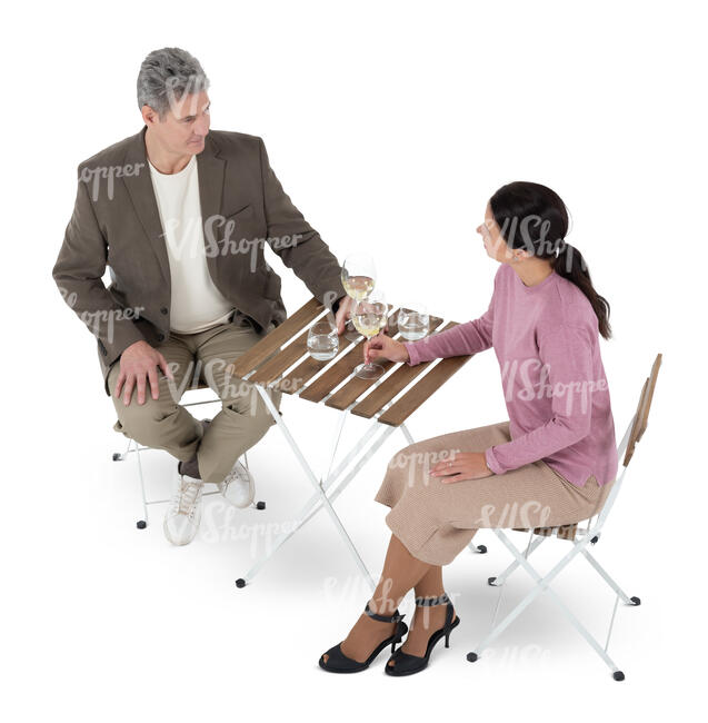 cut out man and woman sitting in a cafe seen from above