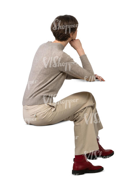 cut out woman sittng and leaning her elbows on a table