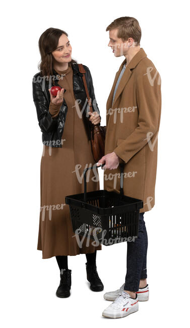 cut out couple buying apples at a grocery store