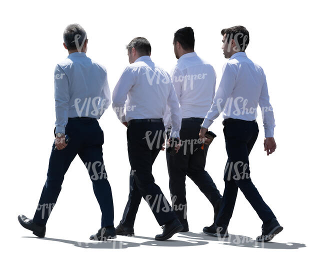 cut out group of backlit businessmen walking