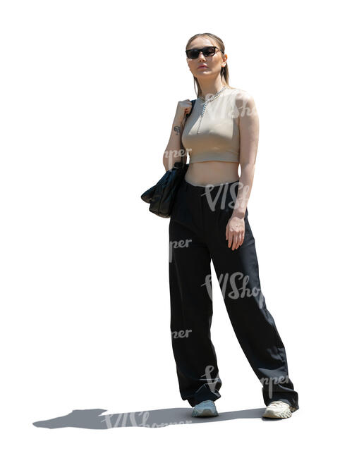 cut out sidelit woman standing