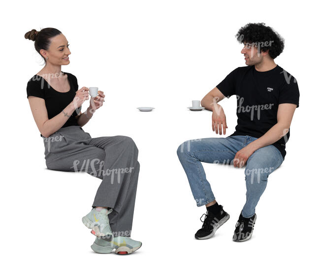 two cut out people sitting in a cafe and drinking coffee