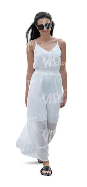 cut out woman in a long white summer dress walking