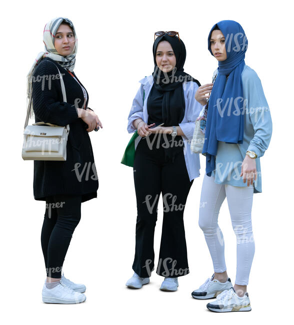 three cut out young muslim girls standing