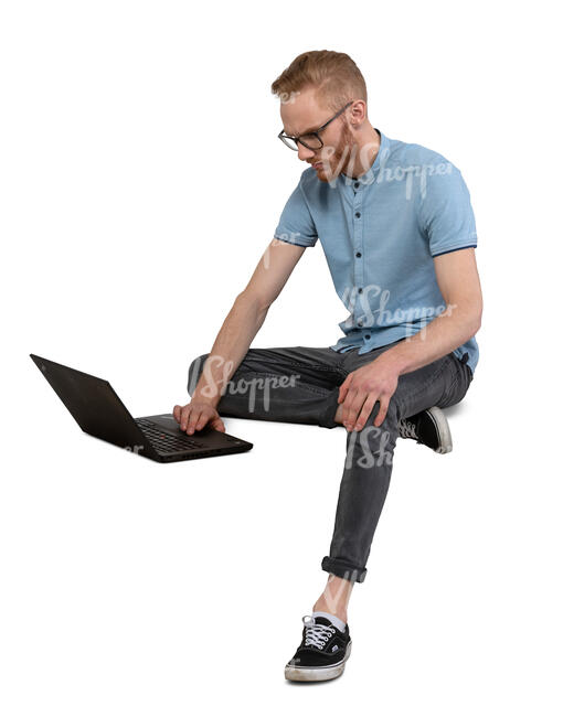 cut out man sitting and working with laptop