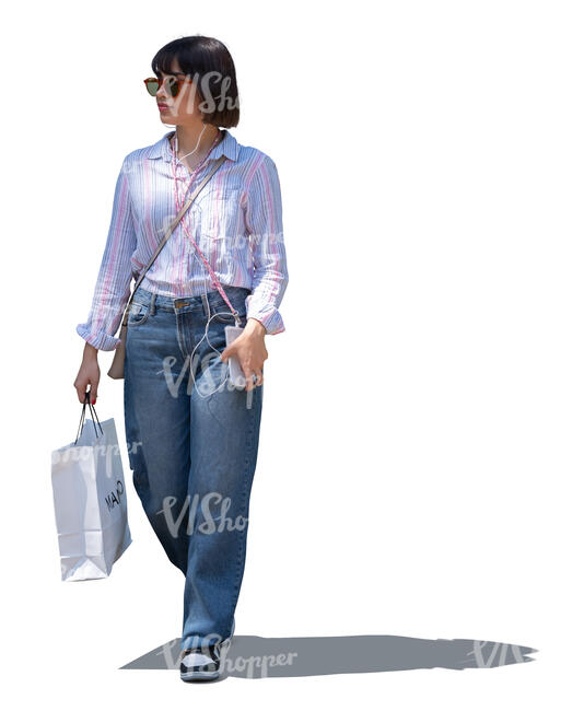 cut out woman with a shopping bag walking in partial shade