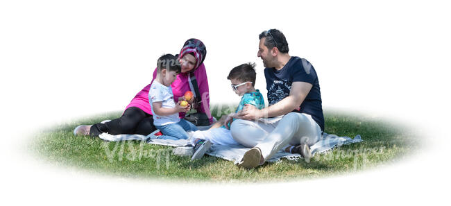 cut out muslim family having a picnic in park