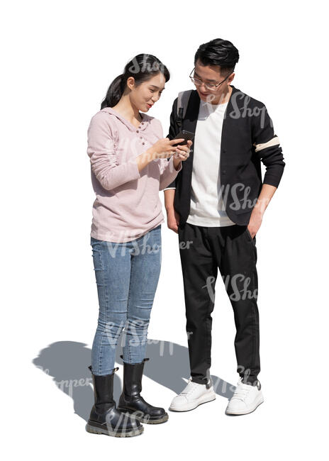 two cut out asian people standing and looking at a phone