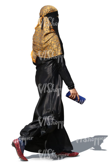 muslim woman wearing a hijab walking 