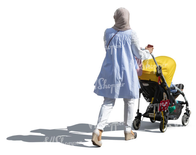muslim woman with a baby stroller walking