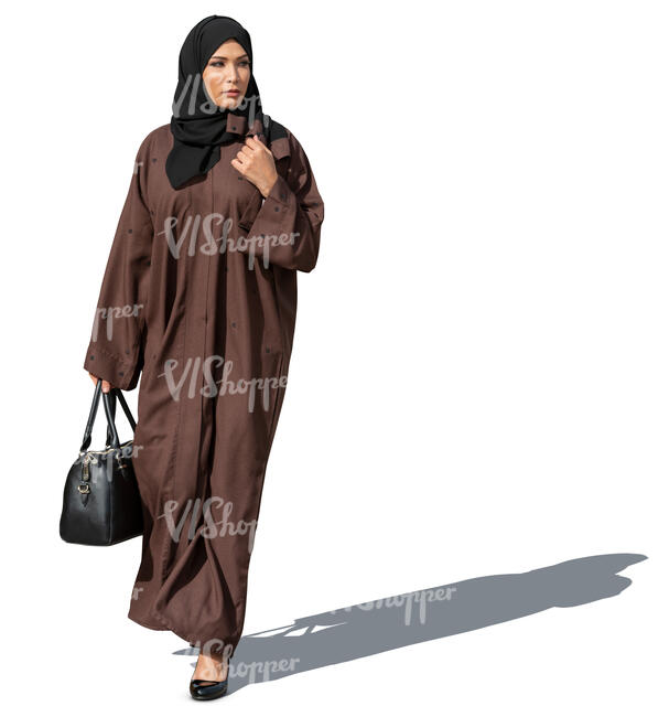 muslim woman in a brown abaya walking